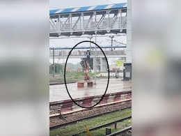 Elderly Man Spotted Doing Yoga In Rain On Railway Platform, Internet Calls It "Aura Farming"