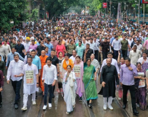 Mamata Banerjee's March In Rain Over 'Harassment' Of Bengali Migrants	
