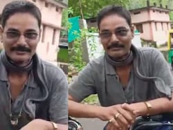 Snake Catcher Rides Bike With Snake Around Neck, Dies After It Bites Him
