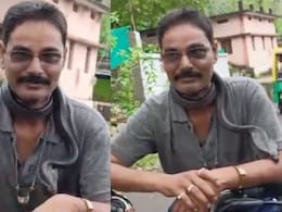 Snake Catcher Rides Bike With Snake Around Neck, Dies After It Bites Him