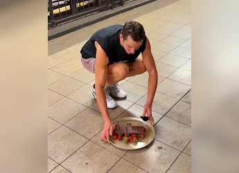 Man Melts Chocolate Over Strawberries With Heat Inside Subway Station, Internet Reacts Man Melts Chocolate Over Strawberries With Heat Inside Subway Station, Internet Reacts