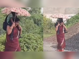 बारिश में भीगी मां, कंधे पर बेटा और चेहरे पर मुस्कान…ममता का सबसे खूबसूरत रूप देख इमोशनल हुए लोग बारिश में भीगी मां, कंधे पर बेटा और चेहरे पर मुस्कान…ममता का सबसे खूबसूरत रूप देख इमोशनल हुए लोग