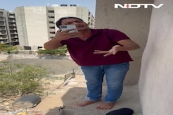 On Camera, Criminal Threatens To Jump Off 5th Floor During Cop Raid In Gujarat On Camera, Criminal Threatens To Jump Off 5th Floor During Cop Raid In Gujarat