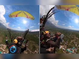 Paragliding करते हुए बंदा खुद को समझने लगा अमिताभ बच्चन, ड्रम बजाकर चिल्लाते हुए गाया गाना Paragliding करते हुए बंदा खुद को समझने लगा अमिताभ बच्चन, ड्रम बजाकर चिल्लाते हुए गाया गाना