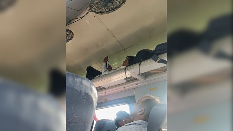 ट्रेन की चेयर कार के लगेज रैक पर लेटा नज़र आया यात्री, वायरल फोटो के लोगों ने लिए मज़े, बोले- आखिर वहां पहुंचा कैसे? ट्रेन की चेयर कार के लगेज रैक पर लेटा नज़र आया यात्री, वायरल फोटो के लोगों ने लिए मज़े, बोले- आखिर वहां पहुंचा कैसे?