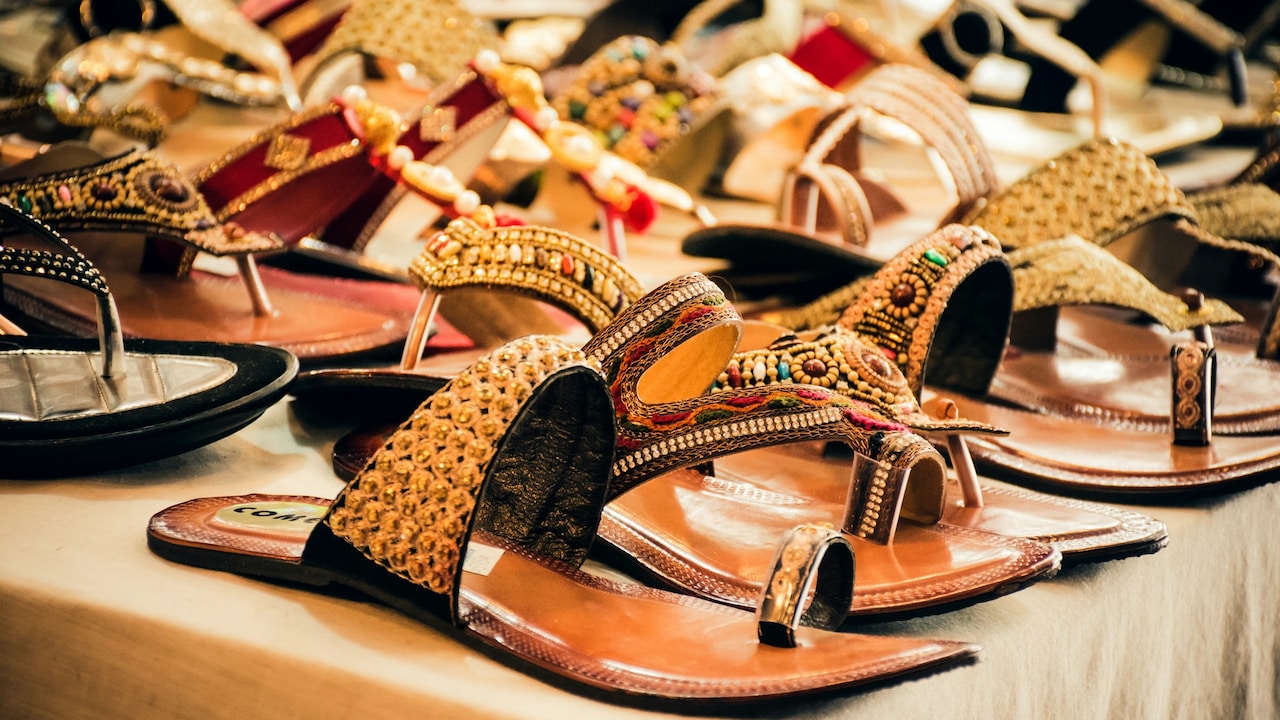 Add a pair of kolhapuris with a little heel or clean juttis to complete the look
