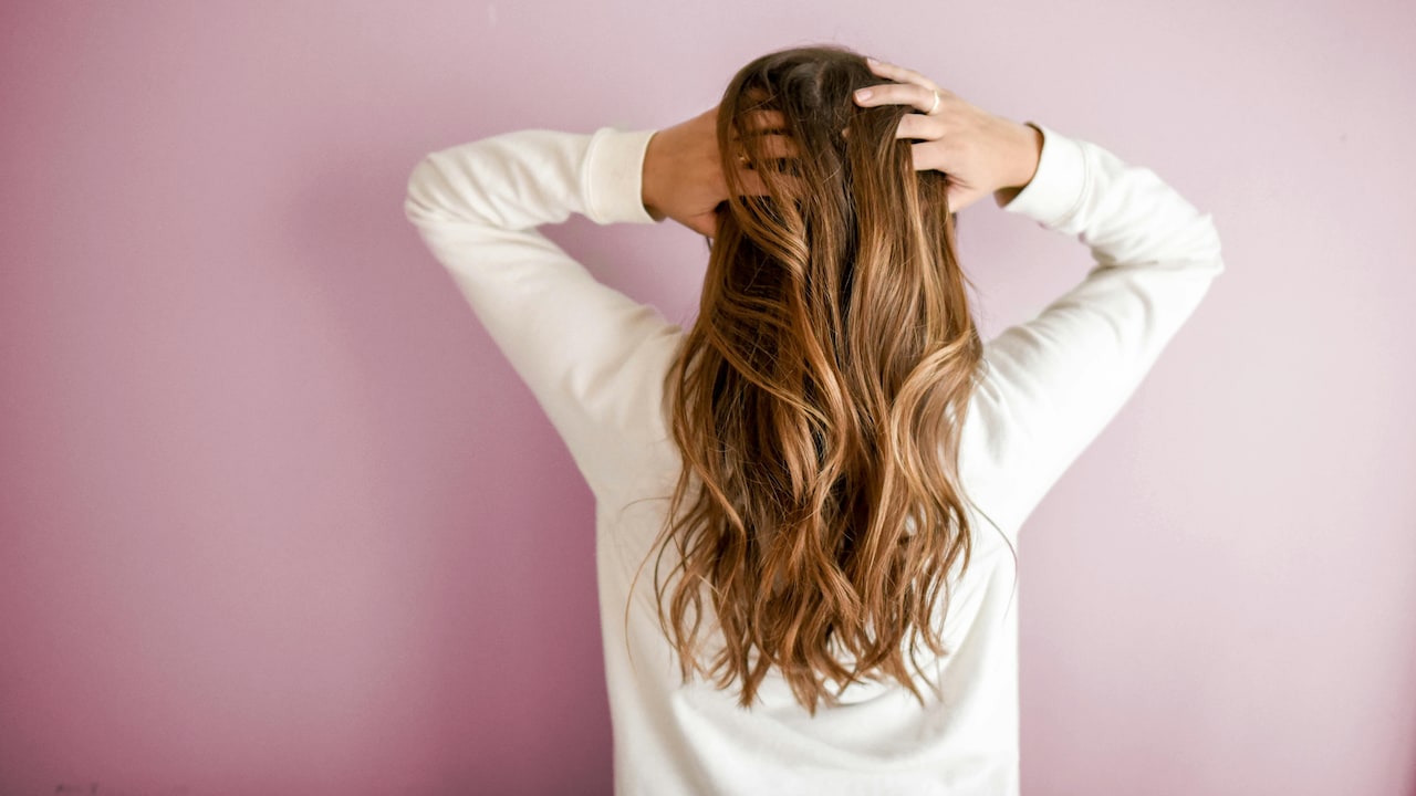 You can use hair oils pre-wash and hair serums post-wash to get the best results