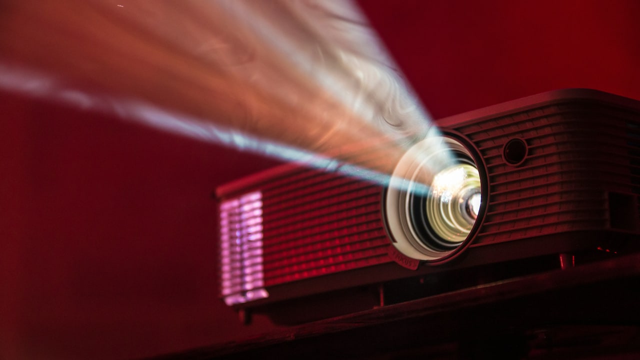 Budget projector & blockbuster dreams, now screening in your bedroom;