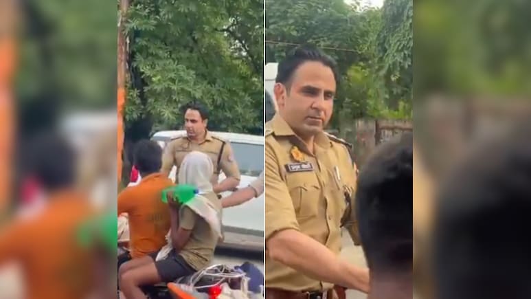 संभल पहुंचे कांवड़ियों की सेवा में जुटे CO अनुज चौधरी, पुष्प वर्षा कर बांटे फल