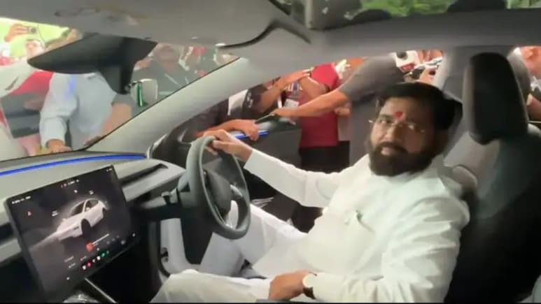 Maharashtra Deputy CM Eknath Shinde Takes Ride In Tesla Model Y: Watch Video Maharashtra Deputy CM Eknath Shinde Takes Ride In Tesla Model Y: Watch Video