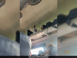 Train Passenger Turns Luggage Rack Into Cozy Berth, Pic Amuses Internet Train Passenger Turns Luggage Rack Into Cozy Berth, Pic Amuses Internet