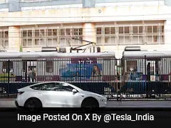 Elon Musk's Tesla Debuts in Mumbai, Model Y Seen Near Local Train