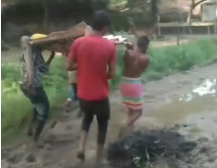 Pregnant Madhya Pradesh Woman Carried On Cot Due To Waterlogged Road