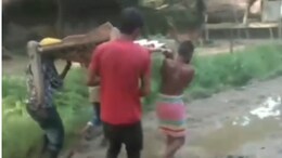 Pregnant Madhya Pradesh Woman Carried On Cot Due To Waterlogged Road