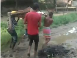 Pregnant Madhya Pradesh Woman Carried On Cot Due To Waterlogged Road Pregnant Madhya Pradesh Woman Carried On Cot Due To Waterlogged Road