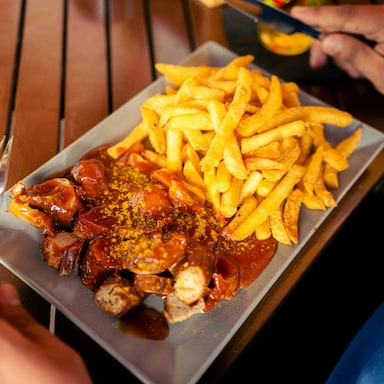 Currywurst: Germany's Popular Street Food Made With Sausage And Sauce