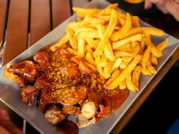 Currywurst: Germany's Popular Street Food Made With Sausage And Sauce Currywurst: Germany's Popular Street Food Made With Sausage And Sauce