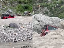 Mahindra Thar Gets Swept By River, Crane Brought To Rescue: Watch Video Mahindra Thar Gets Swept By River, Crane Brought To Rescue: Watch Video