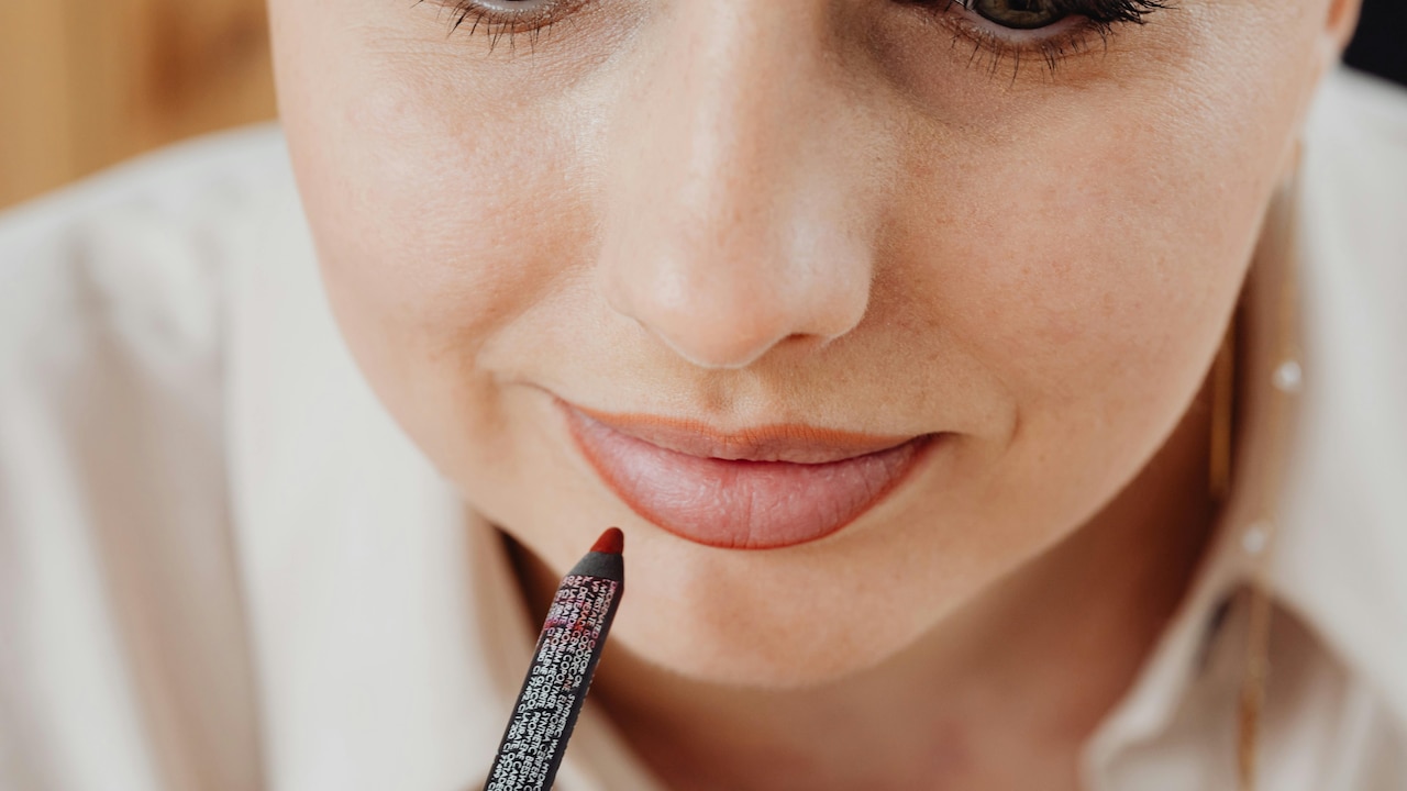 Trace the natural line your lips using a liner