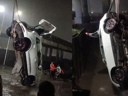 Women Accidentally Drives Car Into Ditch Near Mumbai, Rescued Women Accidentally Drives Car Into Ditch Near Mumbai, Rescued