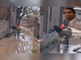 बारिश के पानी में डूबी सड़क पार करने का देसी जुगाड़, वीडियो देख लोग बोले- ये तो देसी स्पाइडरमैन निकला बारिश के पानी में डूबी सड़क पार करने का देसी जुगाड़, वीडियो देख लोग बोले- ये तो देसी स्पाइडरमैन निकला