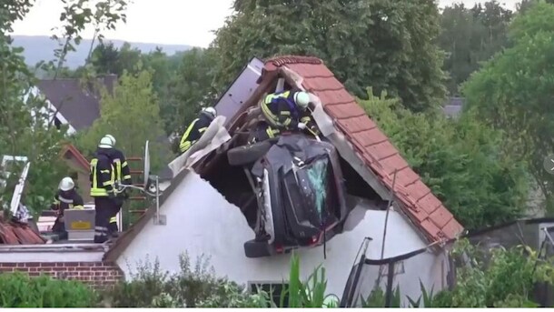 Several Injured As Car Crashes Into Barn's Roof In Germany