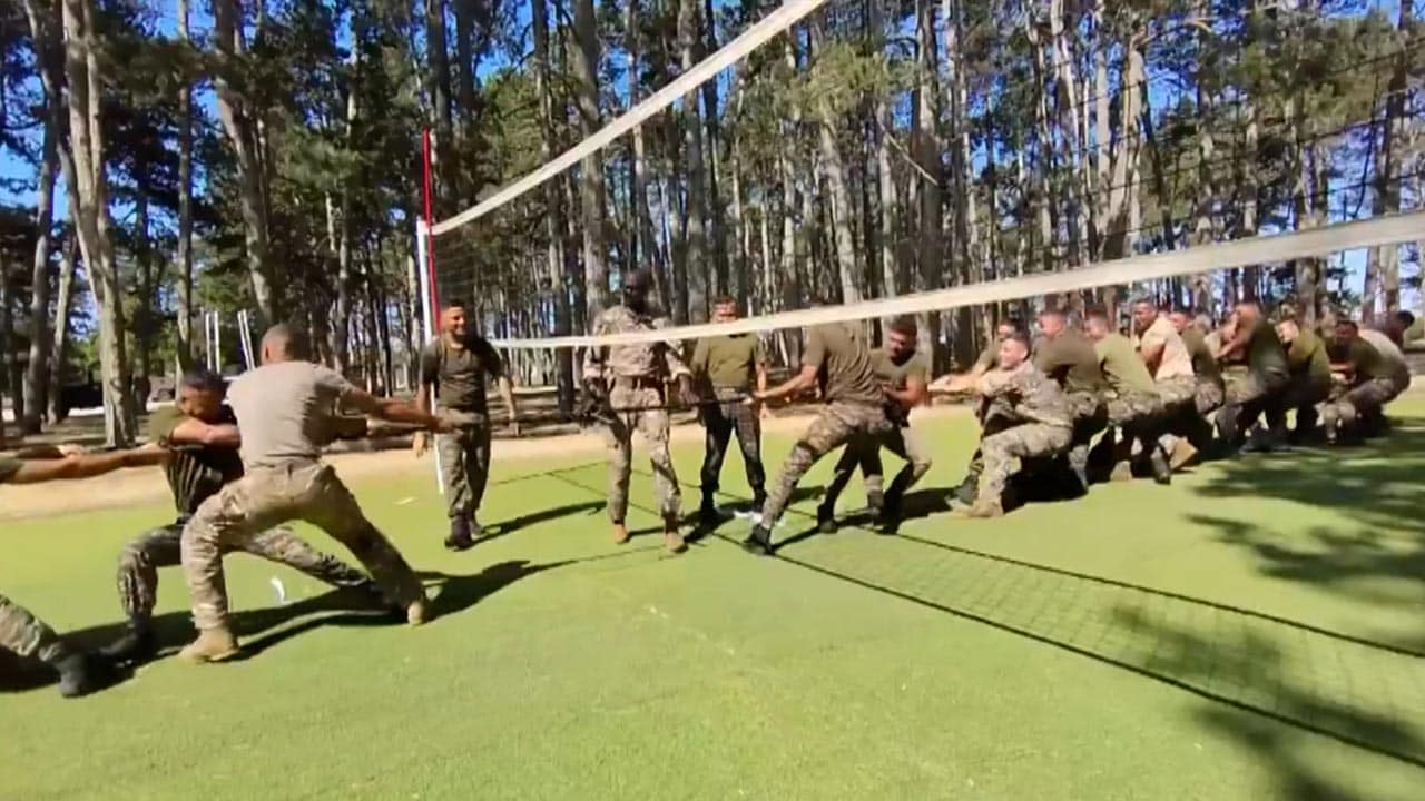 Indian, French Troops Team Together For A Tug Of War Game