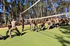 Indian, French Troops Team Together For A Tug Of War Game Indian, French Troops Team Together For A Tug Of War Game
