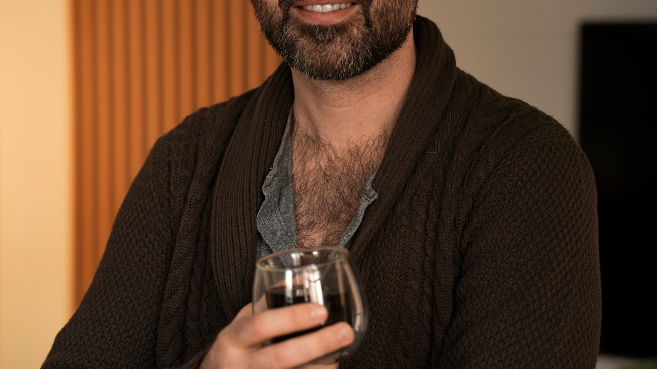 A Close-Up Of Black Water In A Glass, Highlighting Its Distinctive Dark Hue And Mineral-Rich Texture.