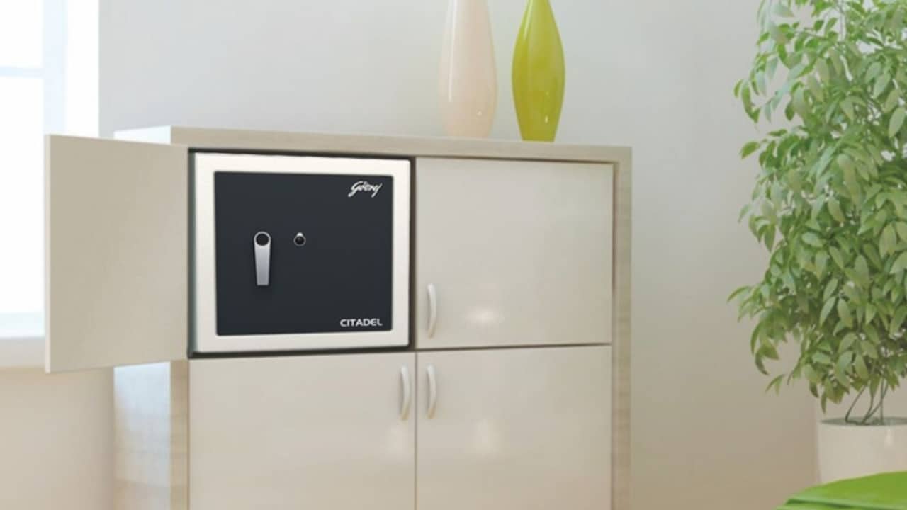 Digital safe installed in a wardrobe for convenient and discreet storage.