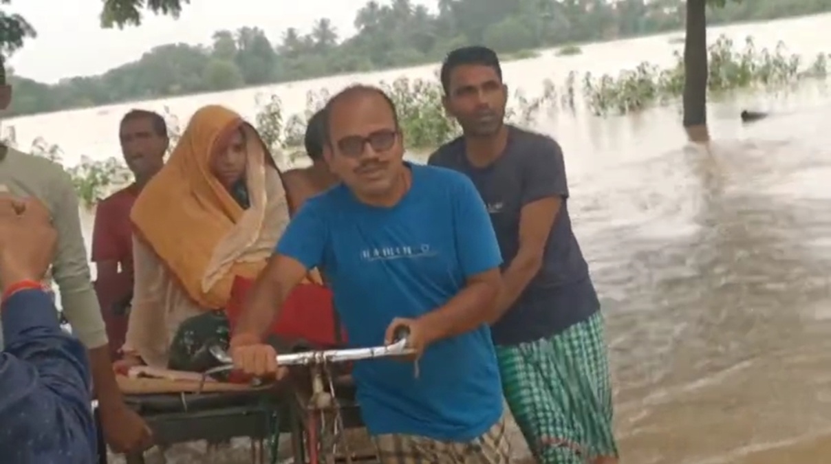 In Flooded Odisha, Doctor Ferries Pregnant Woman To Ambulance On Cart