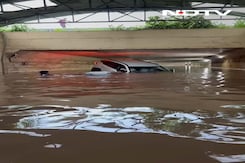 Video: Thane Locals Swim Through Flooded Underpass To Save Stranded Car Passengers Video: Thane Locals Swim Through Flooded Underpass To Save Stranded Car Passengers