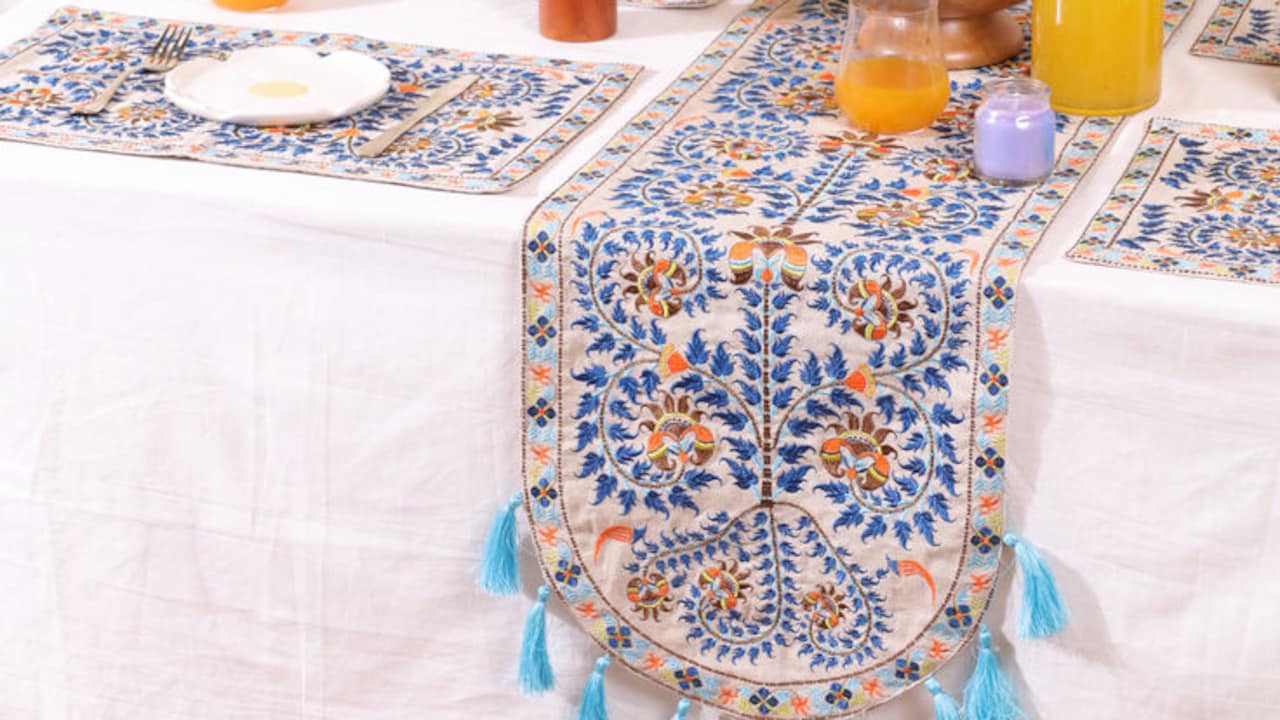 Add charm to your dining table with stylish table runners 