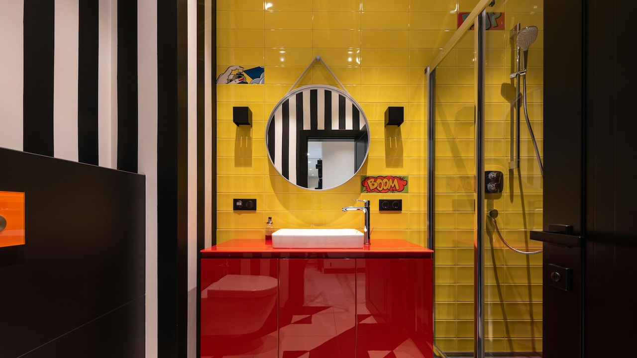 Free-standing bathroom cabinets offer great storage to hold toiletries and cleaning supplies; Photo Credit: Pexels