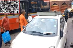 Mumbai: Man Booked For Feeding Pigeons From Tray On Roof Of Car Mumbai: Man Booked For Feeding Pigeons From Tray On Roof Of Car