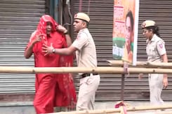 Chaos At First Event By Delhi Chief Minister After Attack, Man Escorted Out Chaos At First Event By Delhi Chief Minister After Attack, Man Escorted Out