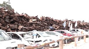 Israel's 'Car Wall': A Graveyard Of Vehicles To Remember Hamas' Terror Attack