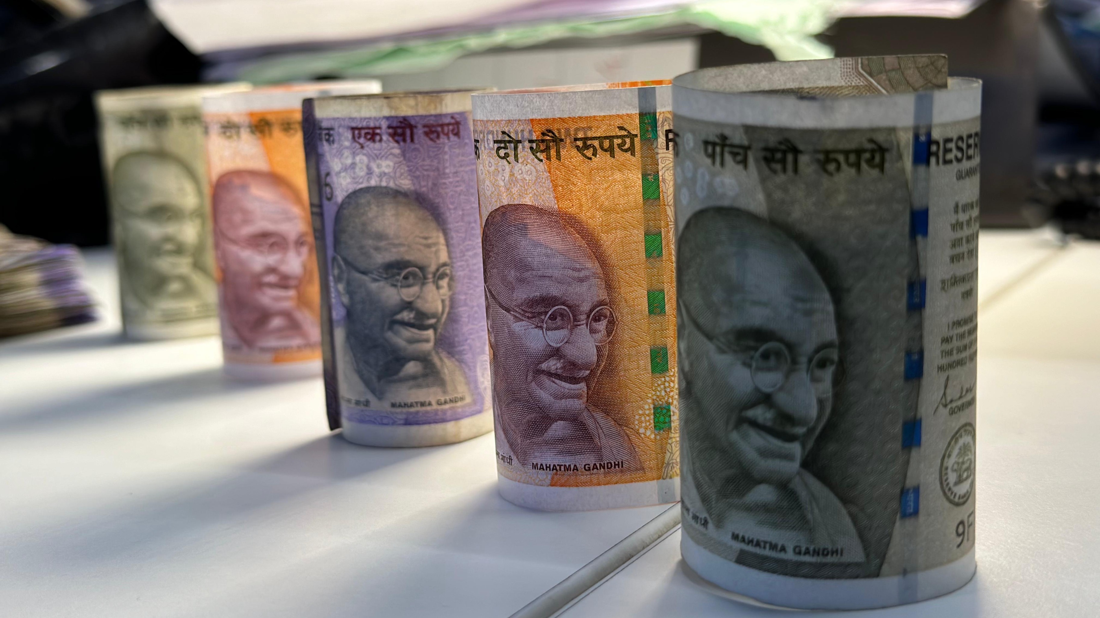 Rupee Closes 14 Paise Weaker Against US Dollar