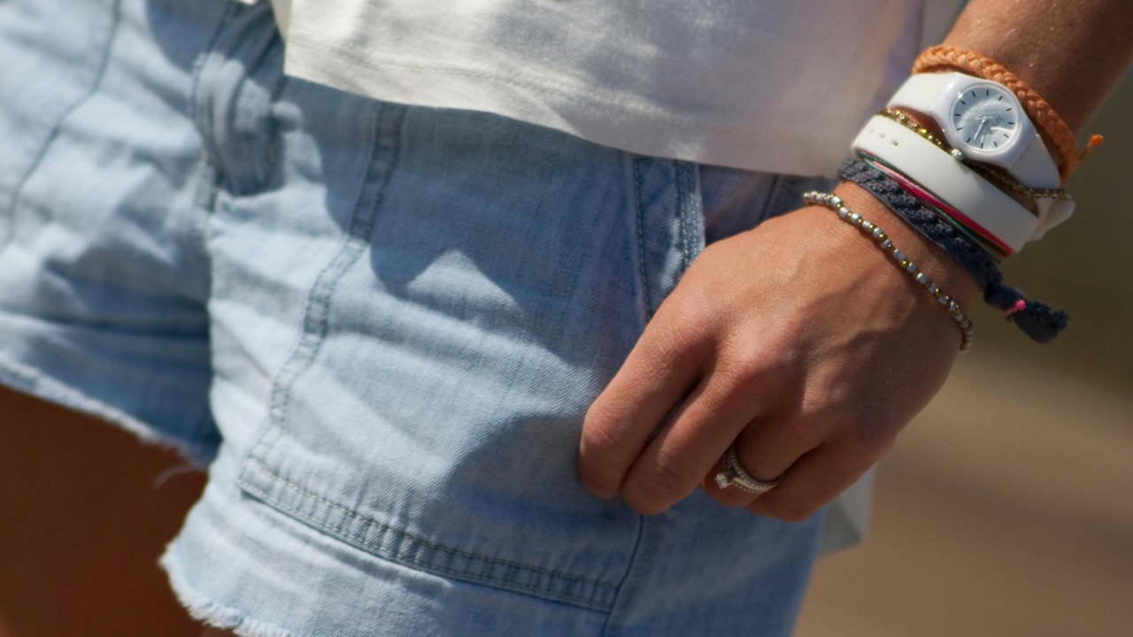 Style chunky bracelets with subtle ones to create a harmony