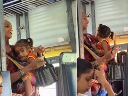कमर पर बच्ची लटकाए और हाथ में पत्थर, रोज़ी-रोटी के लिए ट्रेन में गाती दिखी मां, दर्द भरी आवाज़ कर देगी भावुक कमर पर बच्ची लटकाए और हाथ में पत्थर, रोज़ी-रोटी के लिए ट्रेन में गाती दिखी मां, दर्द भरी आवाज़ कर देगी भावुक