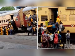 जान जोखिम में डालते हुए चलती ट्रेन पर चढ़ते नजर आए यात्री, वीडियो देख अटक जाएंगे सांसें