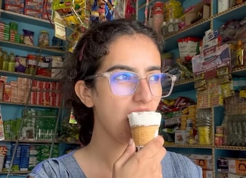 "Living Childhood Dream": Internet Reacts To Woman Eating Snacks From Her Own Kirana Shop