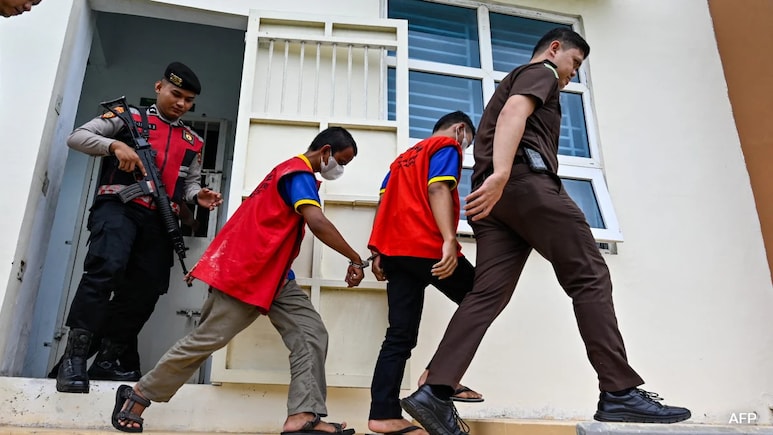 Indonesia Court Sentences 2 Men To Public Caning For Kissing, Hugging Indonesia Court Sentences 2 Men To Public Caning For Kissing, Hugging