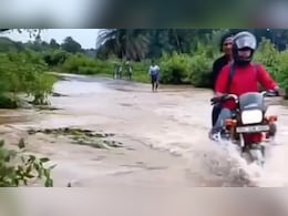 3 Bikers Swept Away While Crossing Flooded Bridge In Odisha, Rescued 3 Bikers Swept Away While Crossing Flooded Bridge In Odisha, Rescued