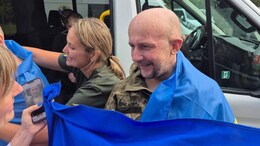 "I'll Be Home Soon": Ukrainian Journalist To Mother After Release From Russian Captivity