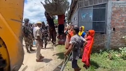 Video: 2 Men Hang Off Earthmover To Stop Eviction Drive In Assam