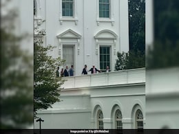 Video: Standing On White House Roof, Trump Jokes About Installing Missiles Video: Standing On White House Roof, Trump Jokes About Installing Missiles
