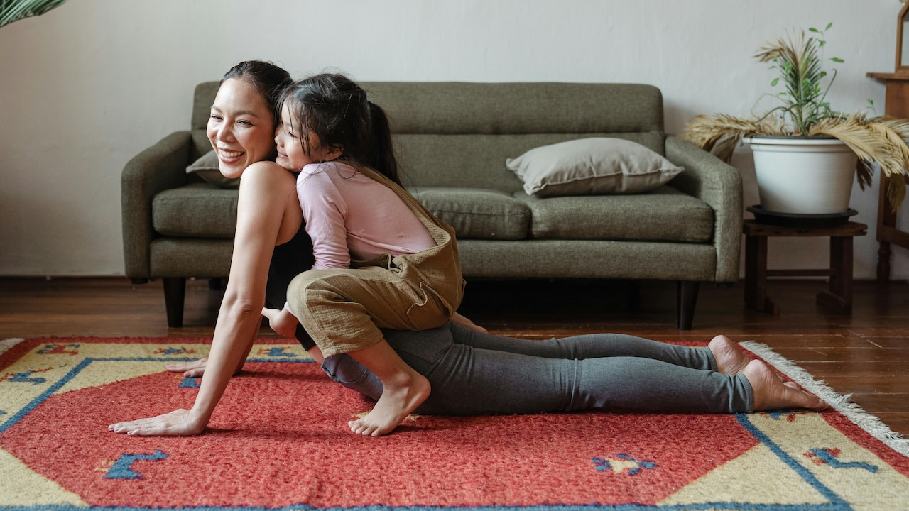 Adding a carpet to your living room can help divide zones without physical walls