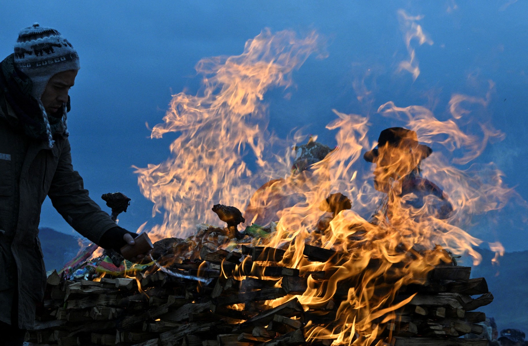 Burnt Offerings, Whispering To Mountains: Bolivians' Rituals For Mother Earth