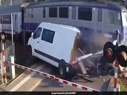 Driver Escapes Unhurt As Speeding Train Crushes Van In Poland, Video Shocks Internet Driver Escapes Unhurt As Speeding Train Crushes Van In Poland, Video Shocks Internet